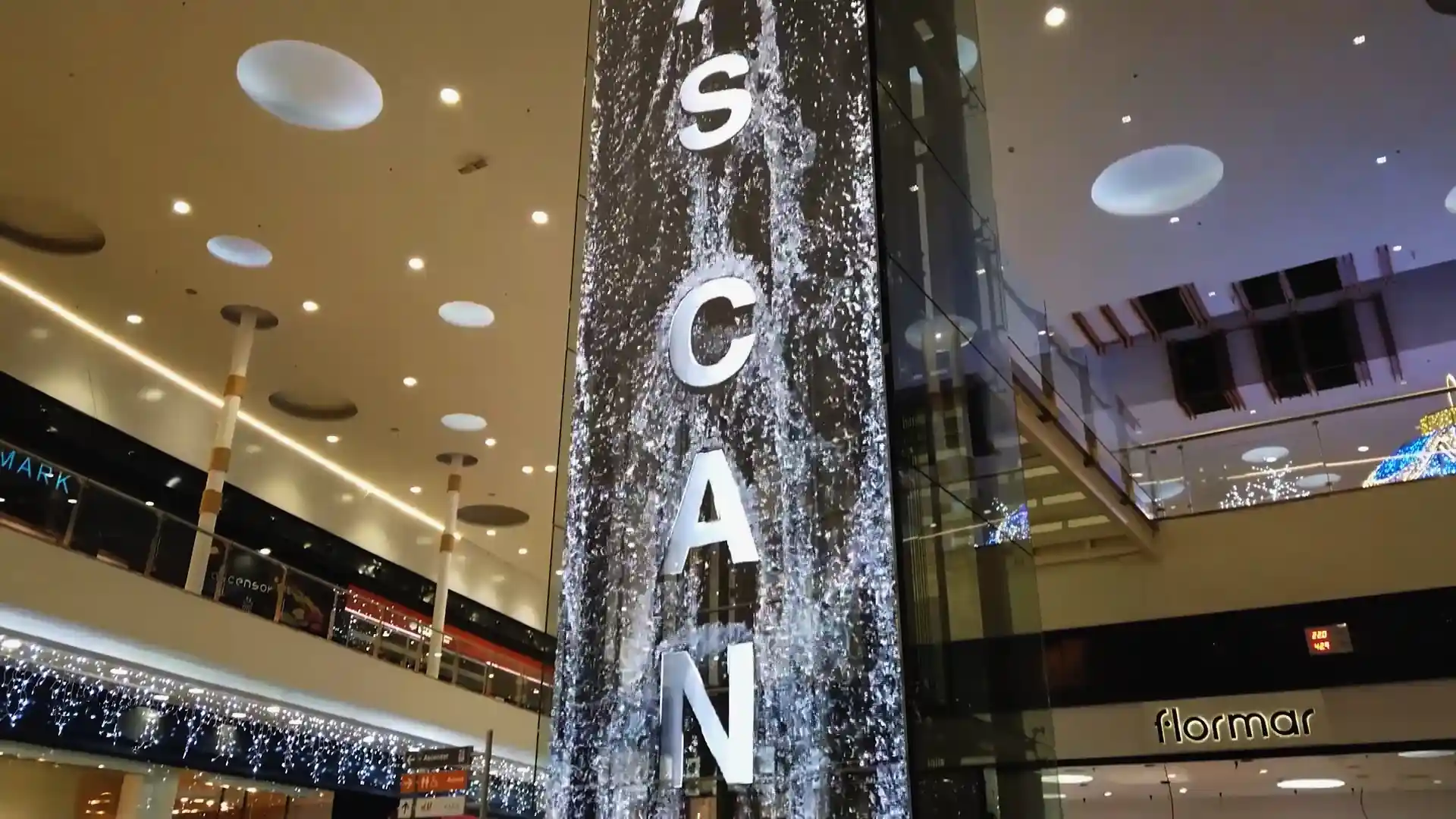 Immersive LED installation inside As Cancelas shopping mall, displaying artistic digital content.