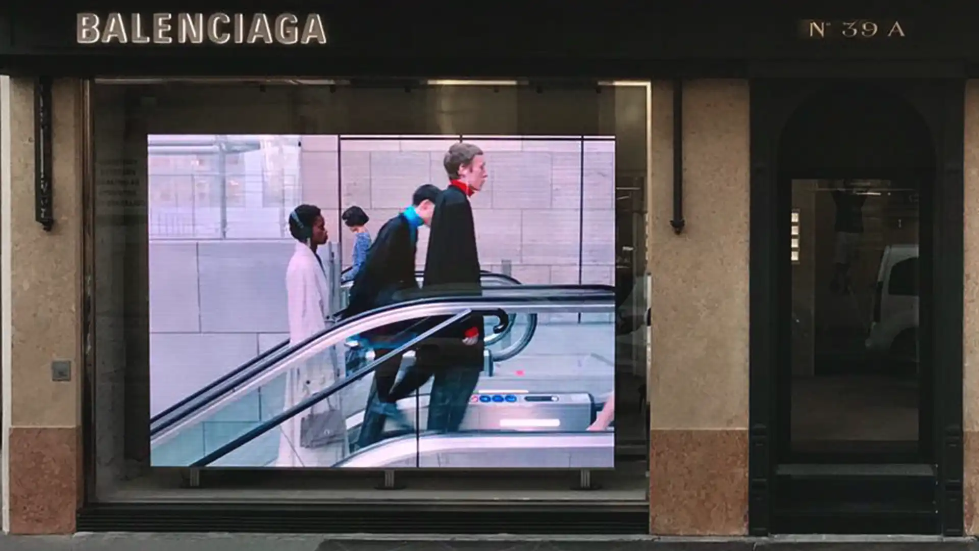 Dynamic LED content in Balenciaga stores showcasing branded visuals aligned with the luxury aesthetic.