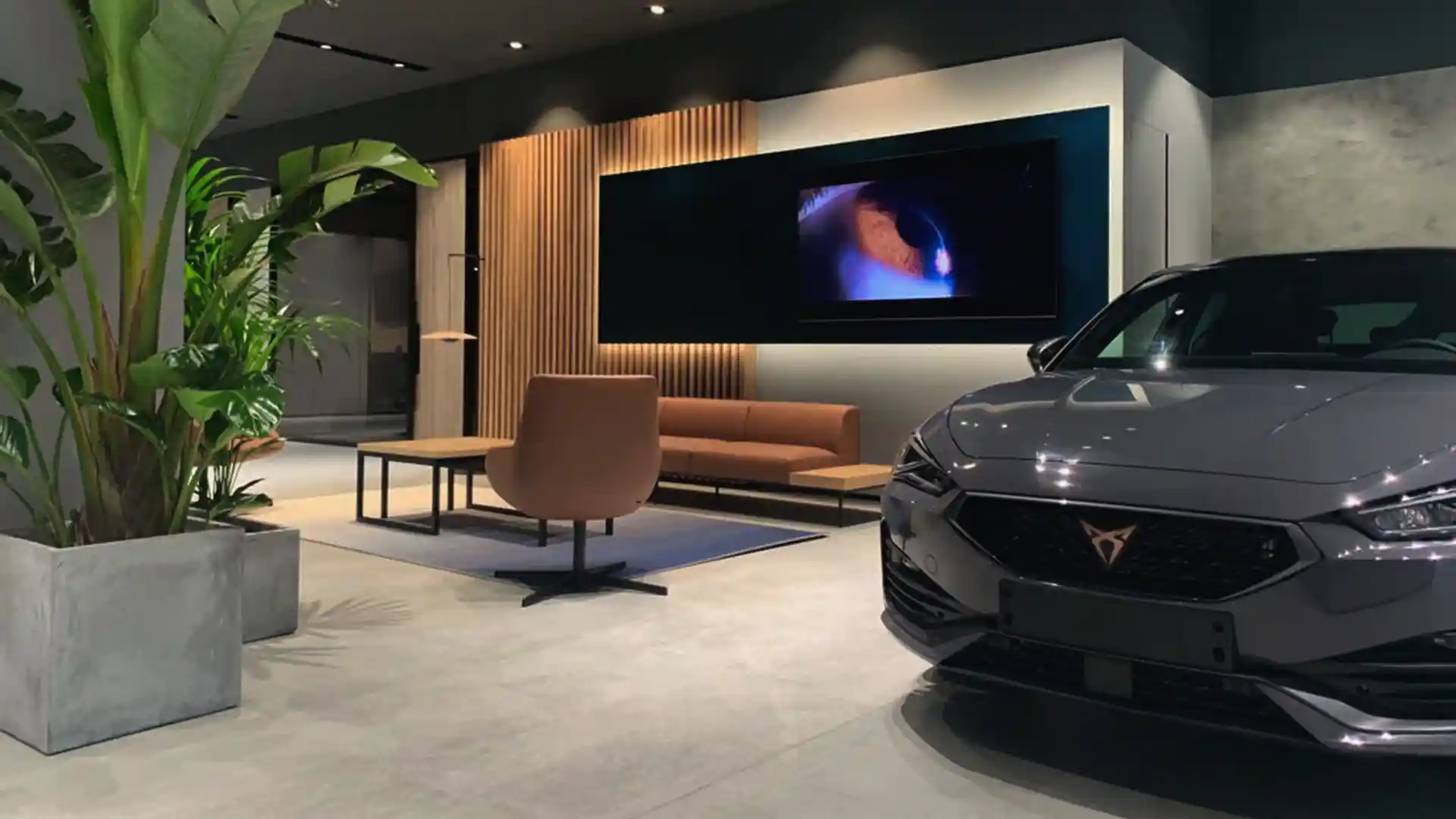 Large-format screens used for events and vehicle delivery moments at CUPRA City Garage Paris