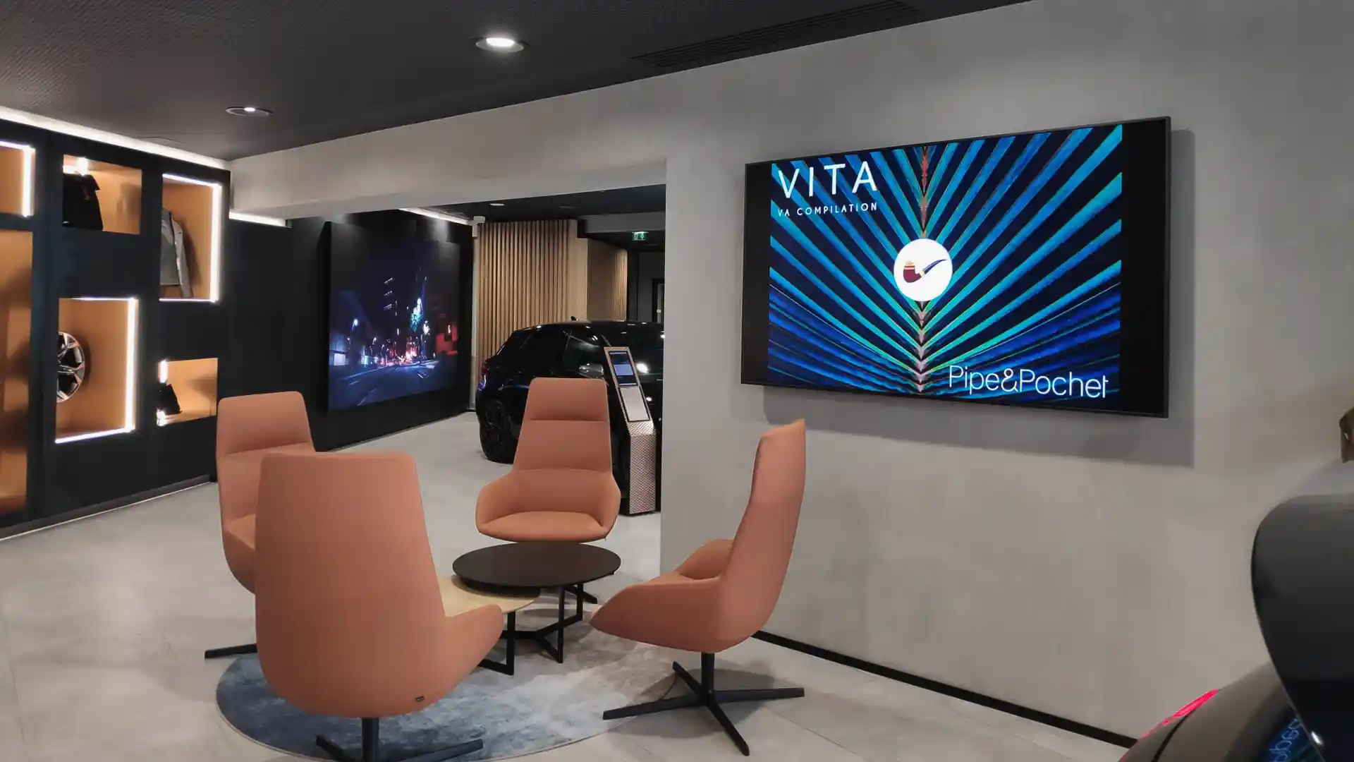 Wireless presentation screens inside CUPRA City Garage Paris supporting flexible communication