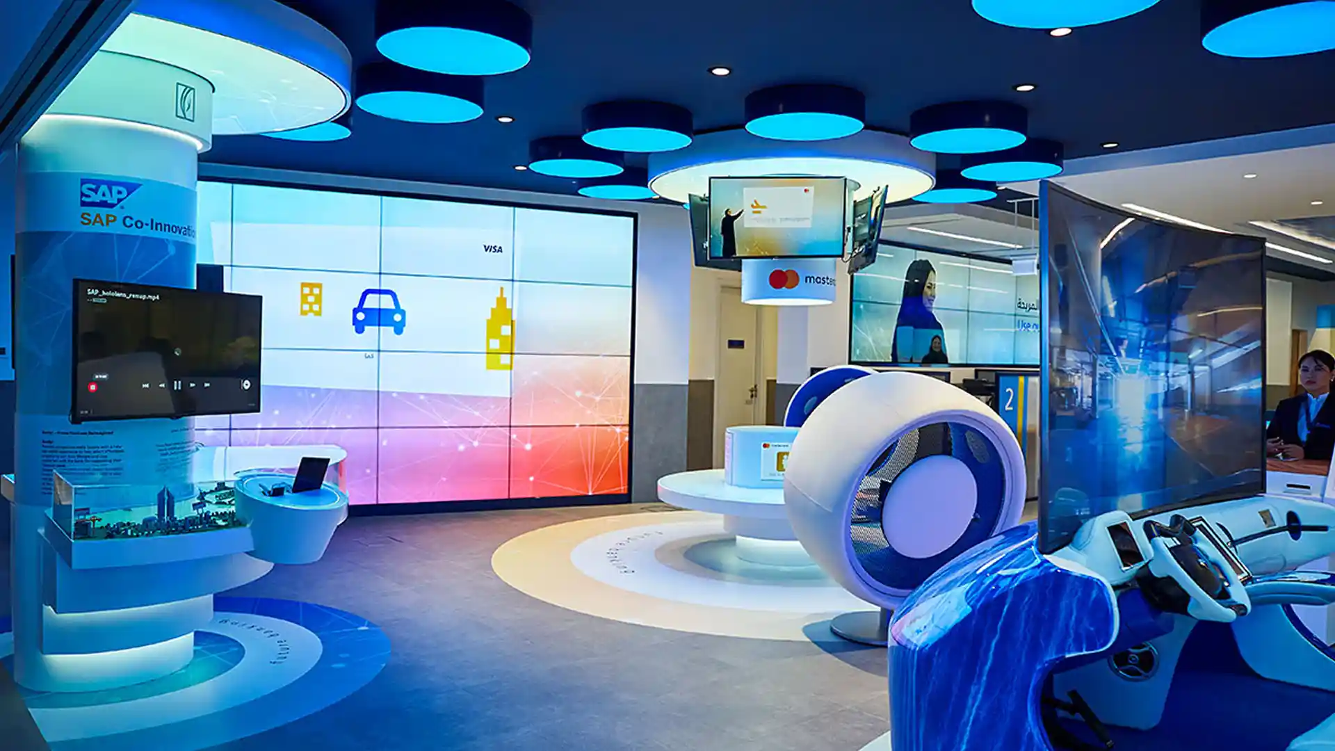 Large-format video wall at Emirates NBD displaying personalized digital content.
