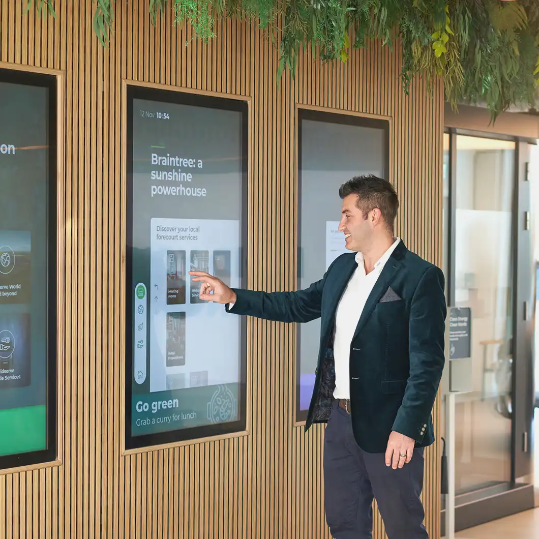Interactive touchscreen explaining EV technology inside Electric Forecourt®.
