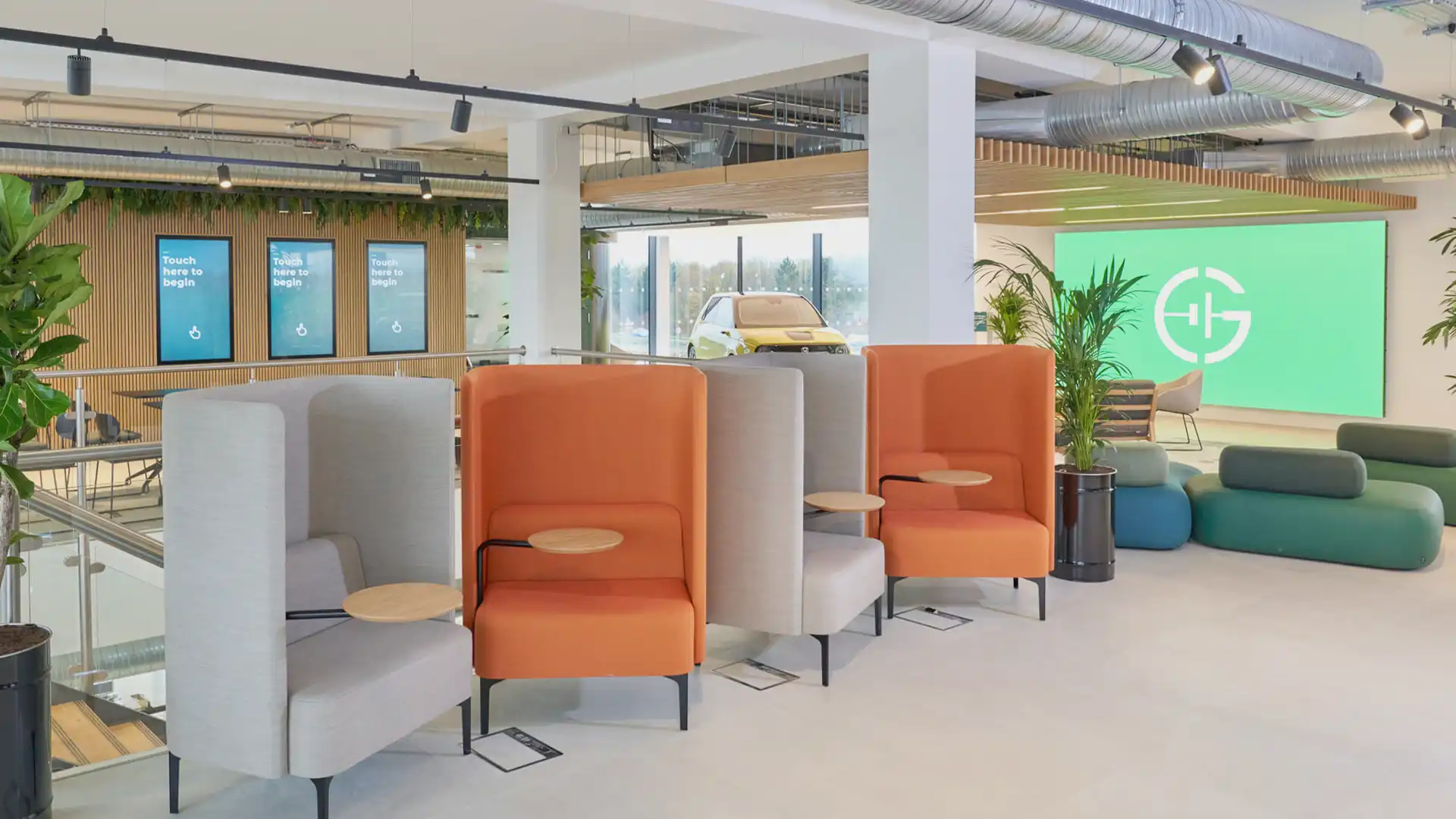 Motion graphics content by TRISON Studio displayed on LED walls at GRIDSERVE Electric Forecourt®.