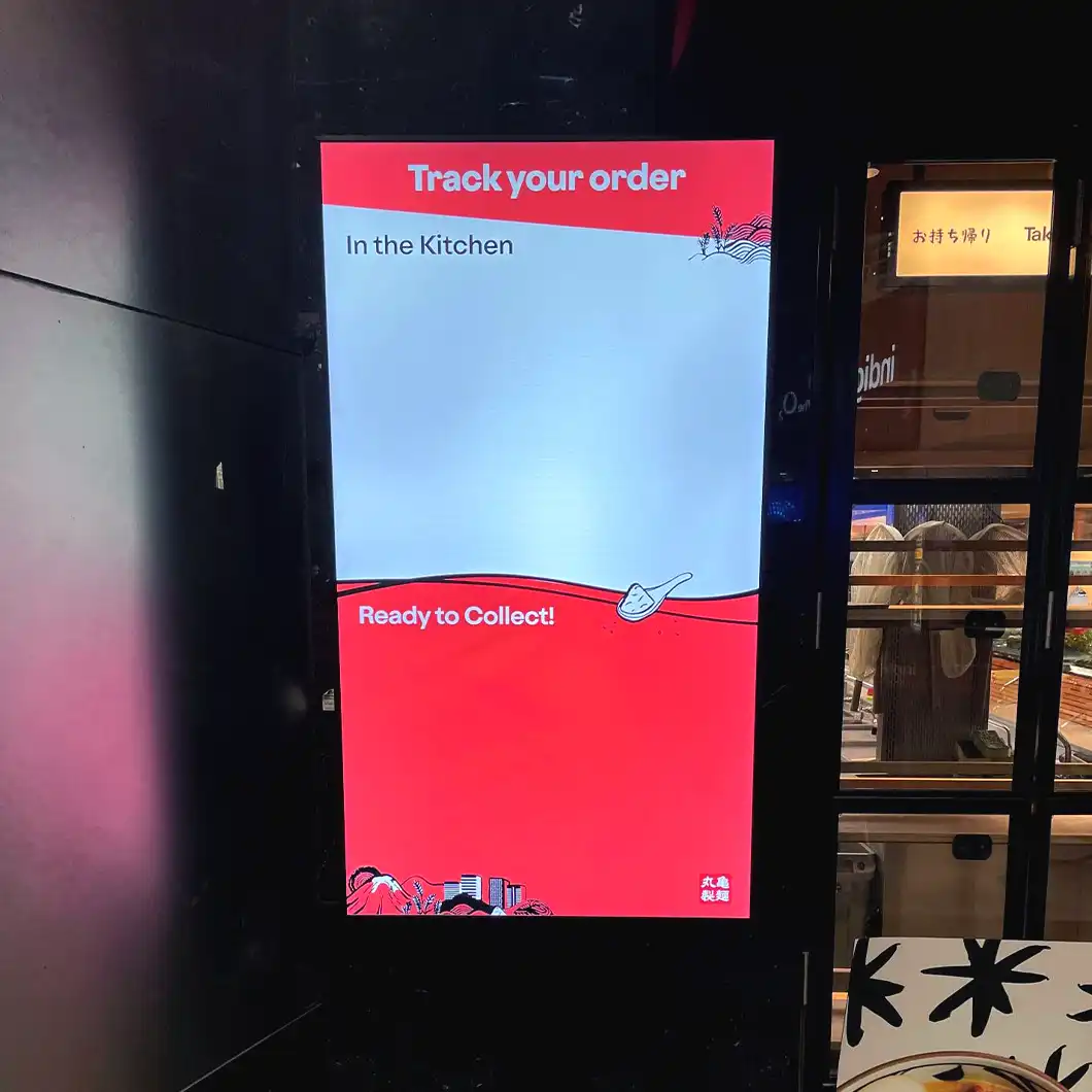 Cinematic digital menu display at Marugame Udon London synchronized with live content through TRISON’s system.