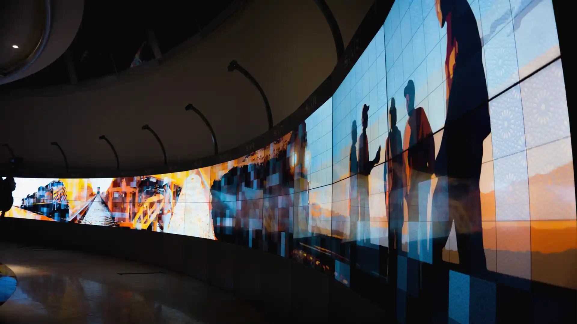 Large curved interactive video wall inside Riyadh Station creating a landmark digital experience for passengers