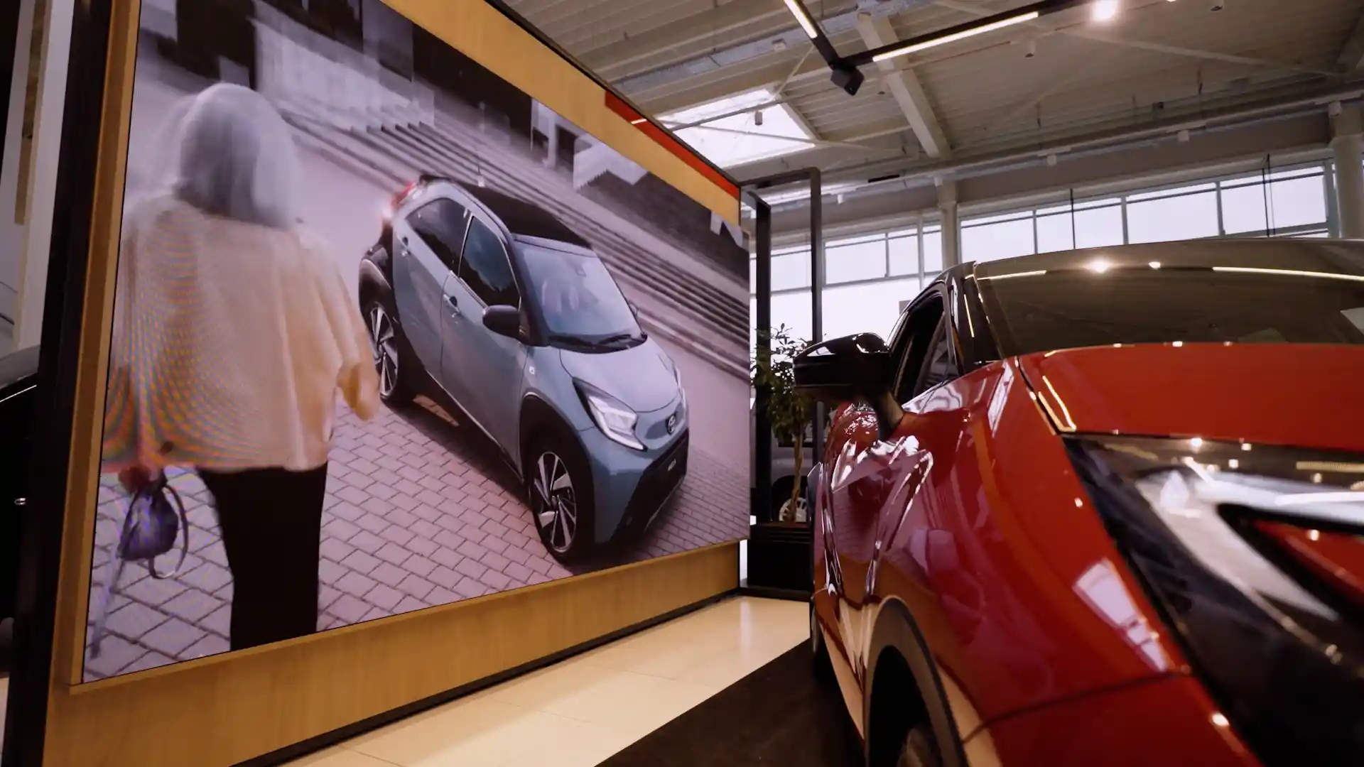 Large LED Hero Wall inside a Toyota dealership showcasing brand visuals.