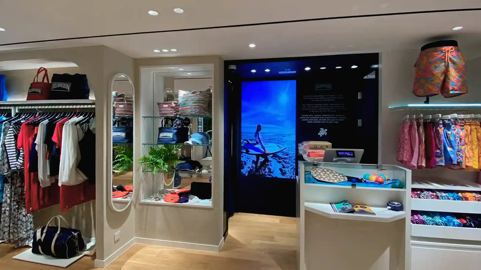 In-store digital displays supporting consistent brand communication in Vilebrequin’s Hong Kong retail space.