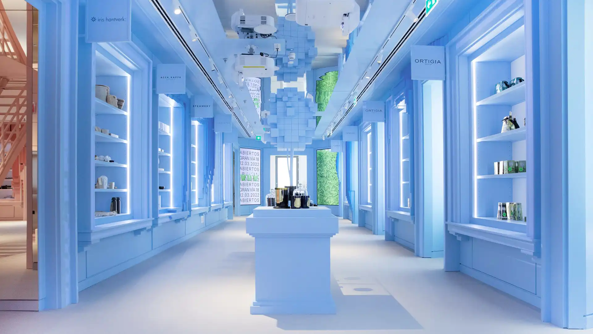 Centralized digital content displayed across WOW Concept’s synchronized screens.