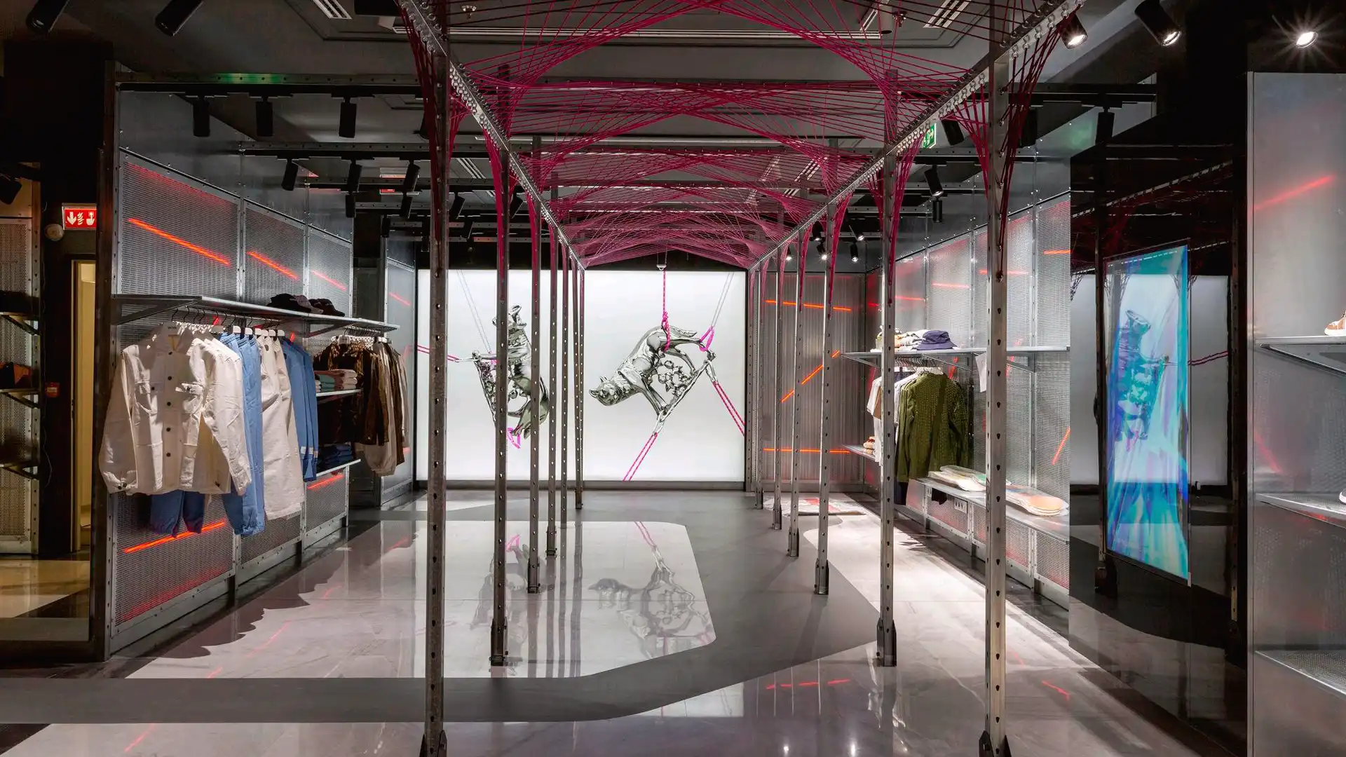 Exterior view of WOW Concept Madrid flagship featuring digital signage elements.