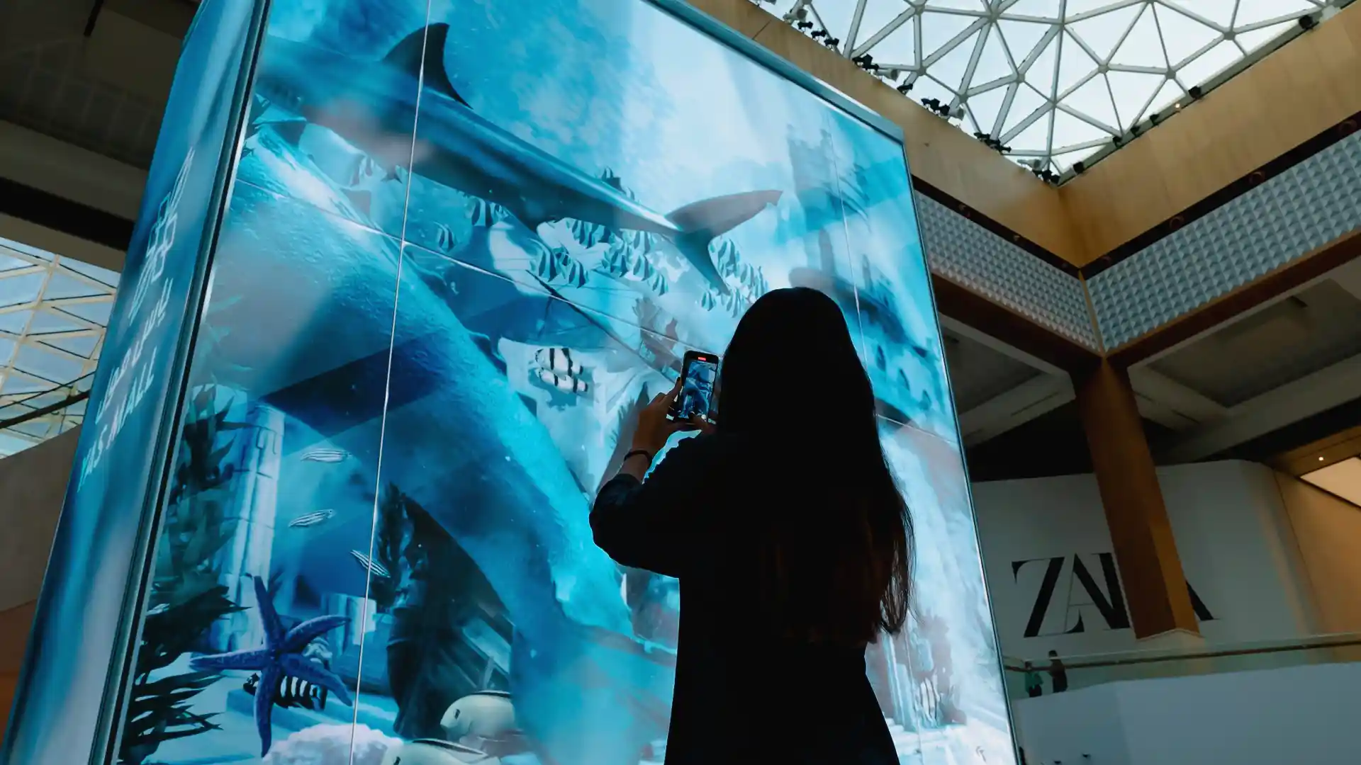 High-resolution 3D visuals displayed on the monumental LED totem inside Yas Mall.